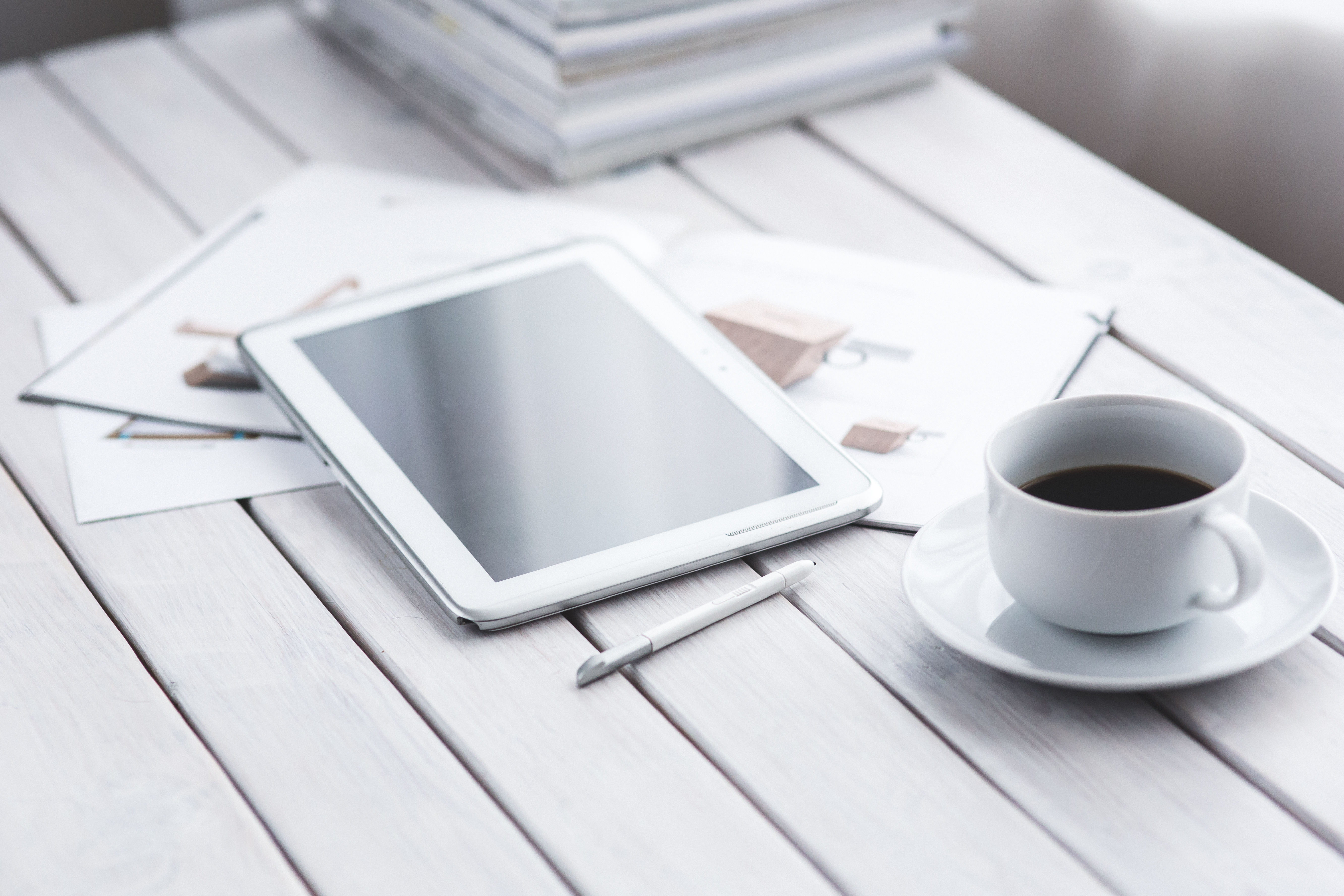 Canva - White tablet and cup of coffee (1)